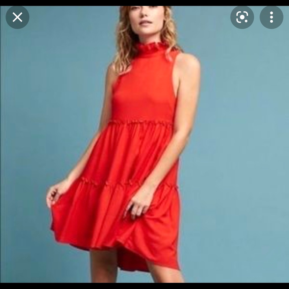 Gorgeous bright red dress with ruffle trim.
